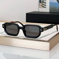 Black Amber frame grey lens