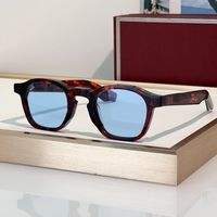 Amber frame blue lens