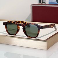 Amber frame green lens