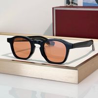 Black frame Orange lens