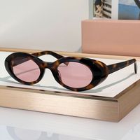 Amber frame pink lens