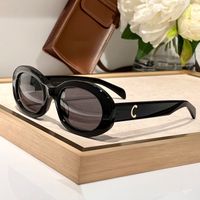 Black gold frame grey lens