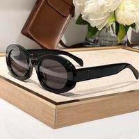 All black frame grey lens