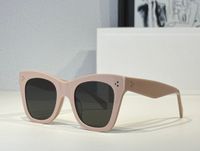Pink frame grey lens