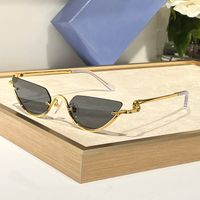 Gold frame grey lens