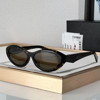 Amber frame brown lens