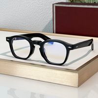 Black frame clear lens