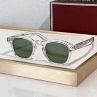 Clear frame green lens