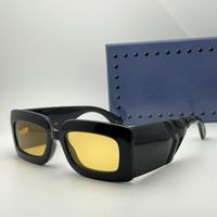 Black frame yellow lens