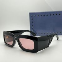 Black frame pink lens