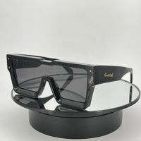 black grey lenses gold letters
