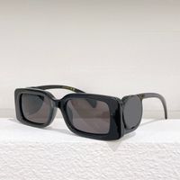 black frame grey lens